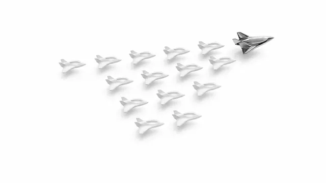 A dozen small white craft flying in arrowhead formation above a white plane, one larger chrome craft at the head.
