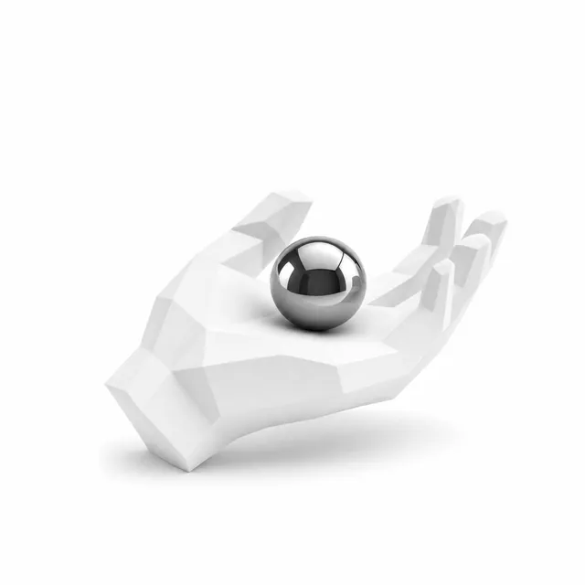 A chrome sphere resting in the upturned palm of a large white sculptural hand.
